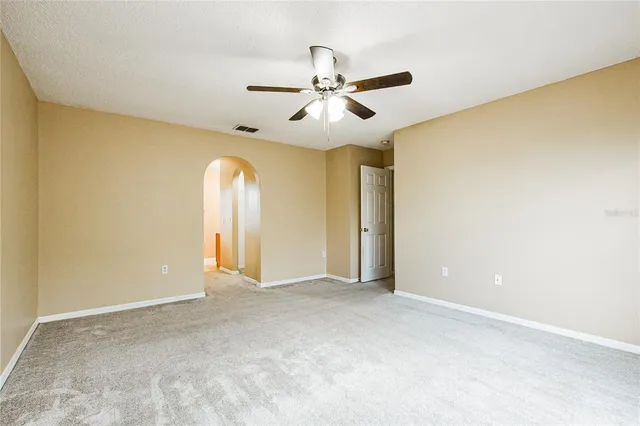 a view of an empty room and window