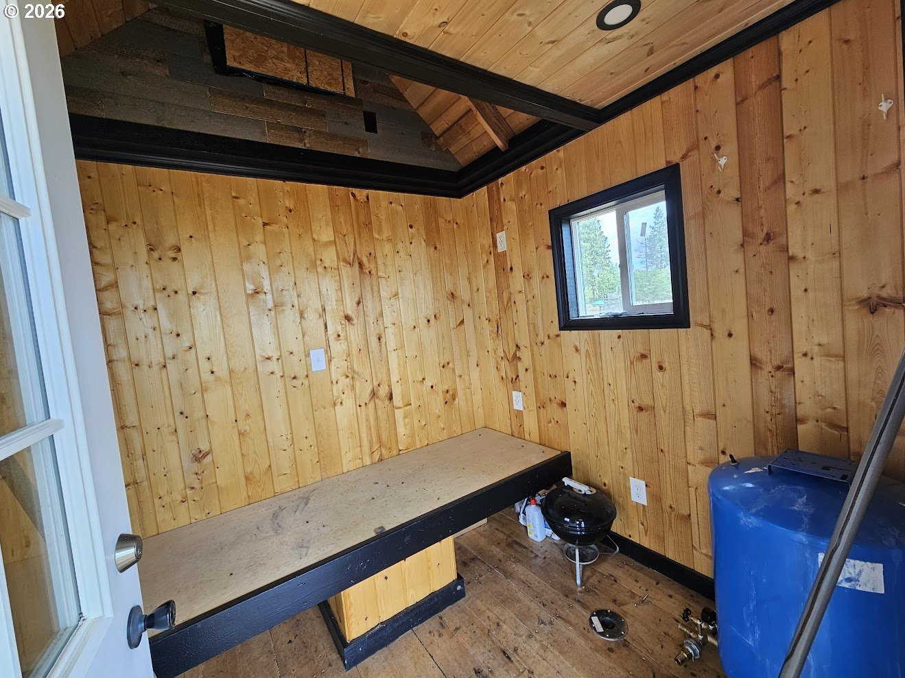 67 Timber Lane Roosevelt, WA 99356 - Photo 2 of 37 a room with wooden door and furniture