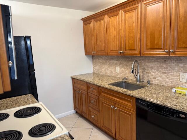 2035 Exeter, Unit 2035 Boca Raton, FL 33434 - Photo 3 of 15 a kitchen with a sink and cabinets