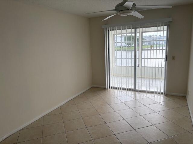 2035 Exeter, Unit 2035 Boca Raton, FL 33434 - Photo 10 of 15 a view of an empty room and window