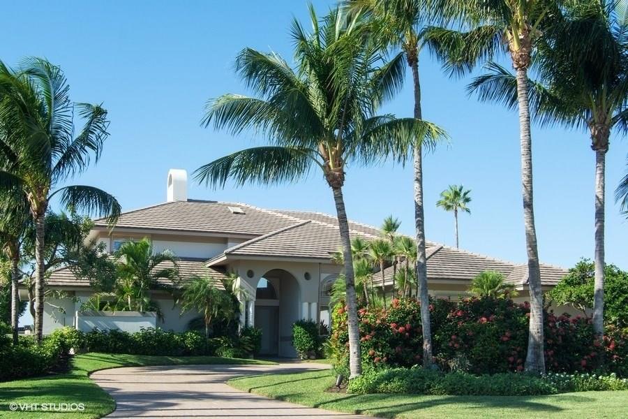 6900 Southeast Harbor Circle Stuart, FL 34996 - Photo 1 of 33 a front view of a house with swimming pool