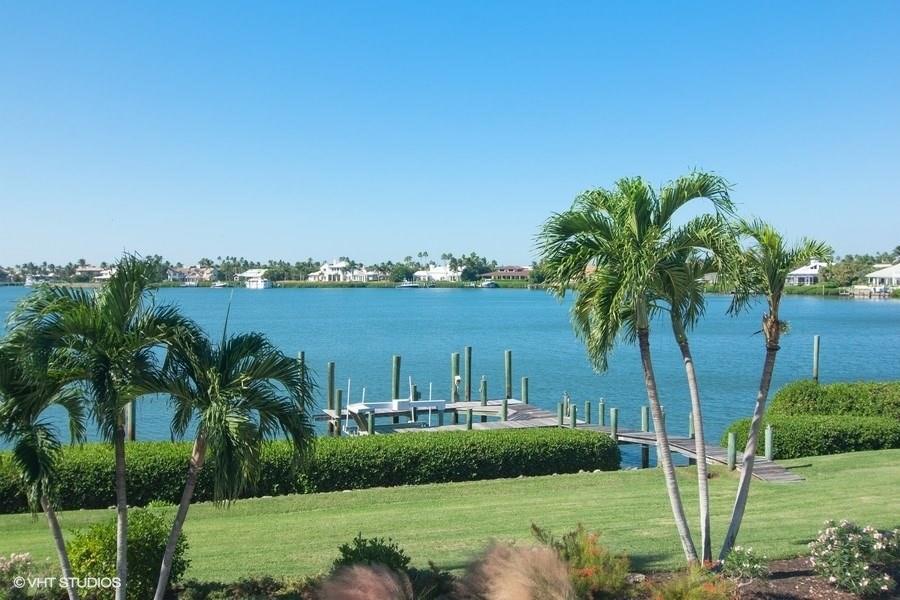 6900 Southeast Harbor Circle Stuart, FL 34996 - Photo 11 of 33 a view of a big yard with palm trees