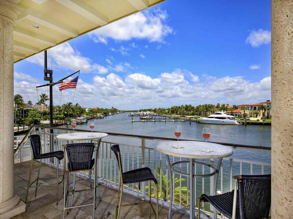 6900 Southeast Harbor Circle Stuart, FL 34996 - Photo 23 of 33 a view of a chairs and table in patio