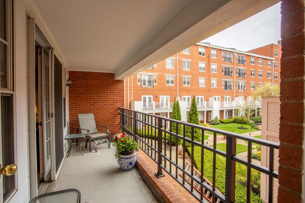 11 Church Street, Unit 101 Salem, MA 01970 - Photo 1 of 31 a view of a balcony with chairs