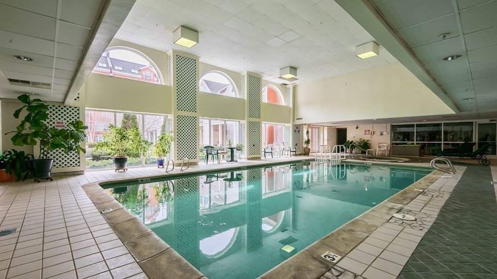 11 Church Street, Unit 101 Salem, MA 01970 - Photo 23 of 31 a view of swimming pool with outdoor seating