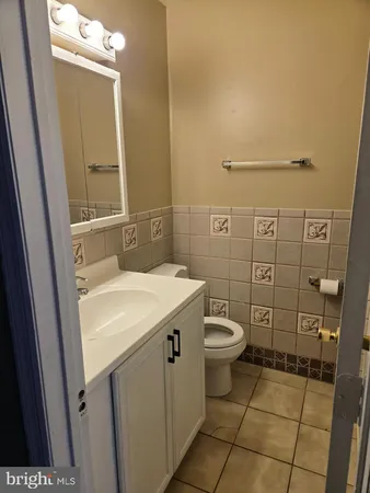 a bathroom with a sink and toilet