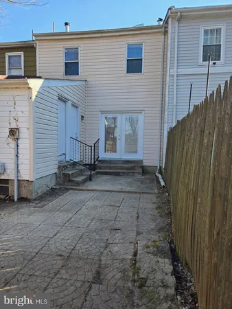 a view of a back yard of the house