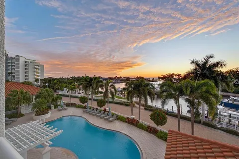a view of a swimming pool with a patio