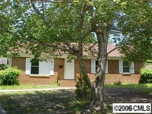 6621 Willow Spring Road Charlotte, NC 28215 - Photo 2 of 7 a front view of a house with garden