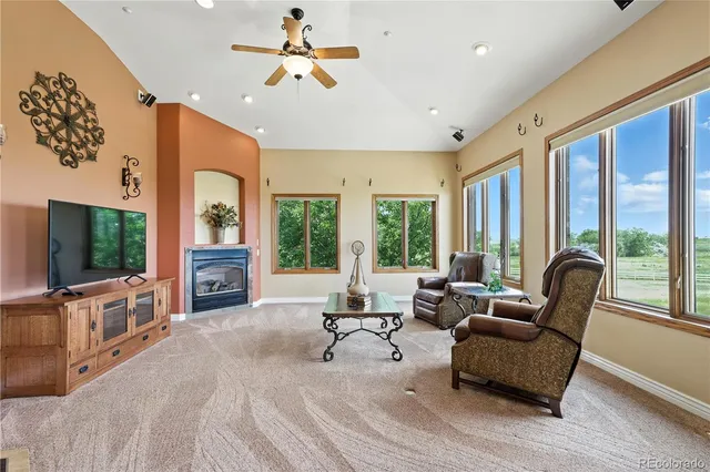 a utility room with cabinets washer and dryer