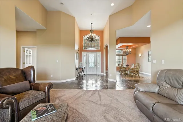 a bedroom with a bed and dresser