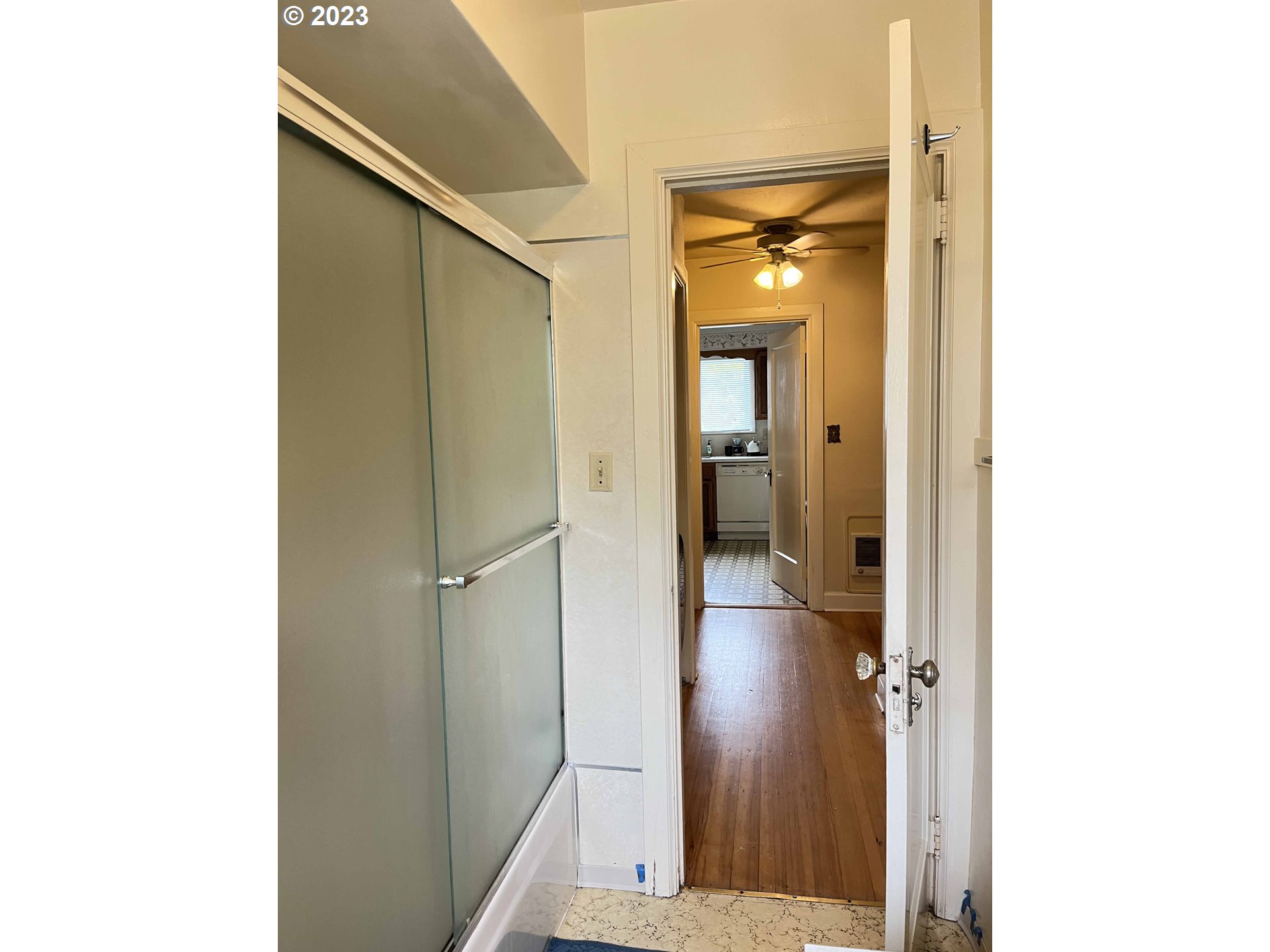 611 Laurel Street Florence, OR 97439 - Photo 23 of 32 a view of a hallway with wooden floor