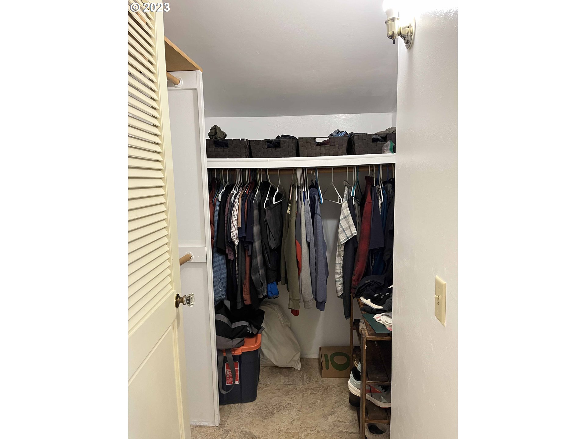 611 Laurel Street Florence, OR 97439 - Photo 27 of 32 a view of walk in closet with clothes and shoes