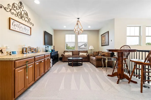 a very nice looking living room with a large window