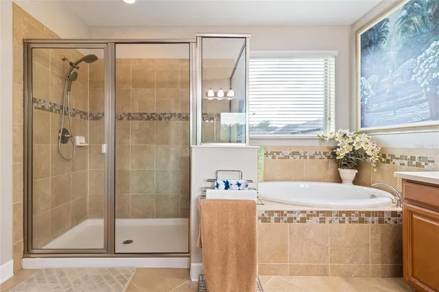 a bathroom with a shower and a sink