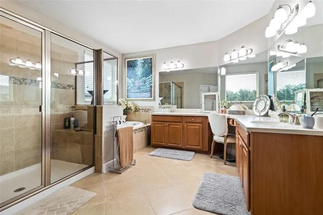 a room with a large window and glass door