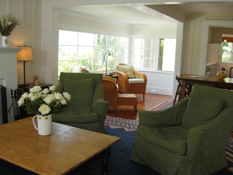 49 Humphrey Road Santa Barbara, CA 93108 - Photo 6 of 17 a living room with furniture potted plant and a large window