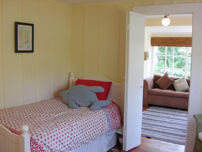 49 Humphrey Road Santa Barbara, CA 93108 - Photo 9 of 17 a bedroom with a bed and wooden floor