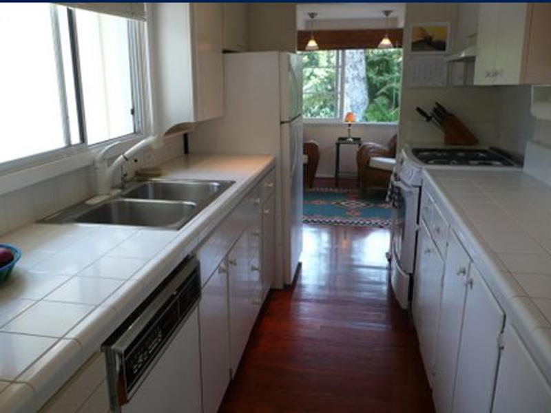 49 Humphrey Road Santa Barbara, CA 93108 - Photo 10 of 17 a kitchen that has a sink and a stove