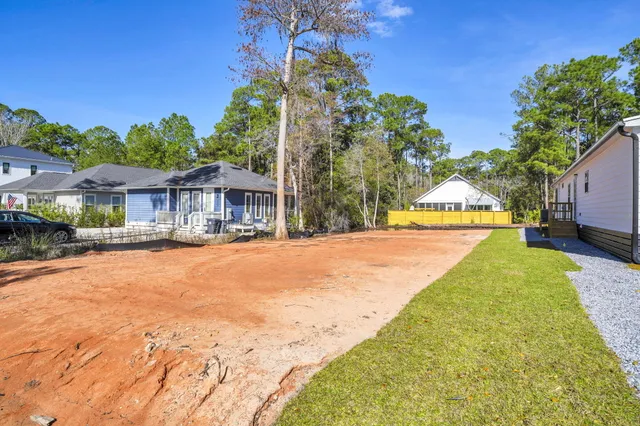 a house with swimming pool in front of it