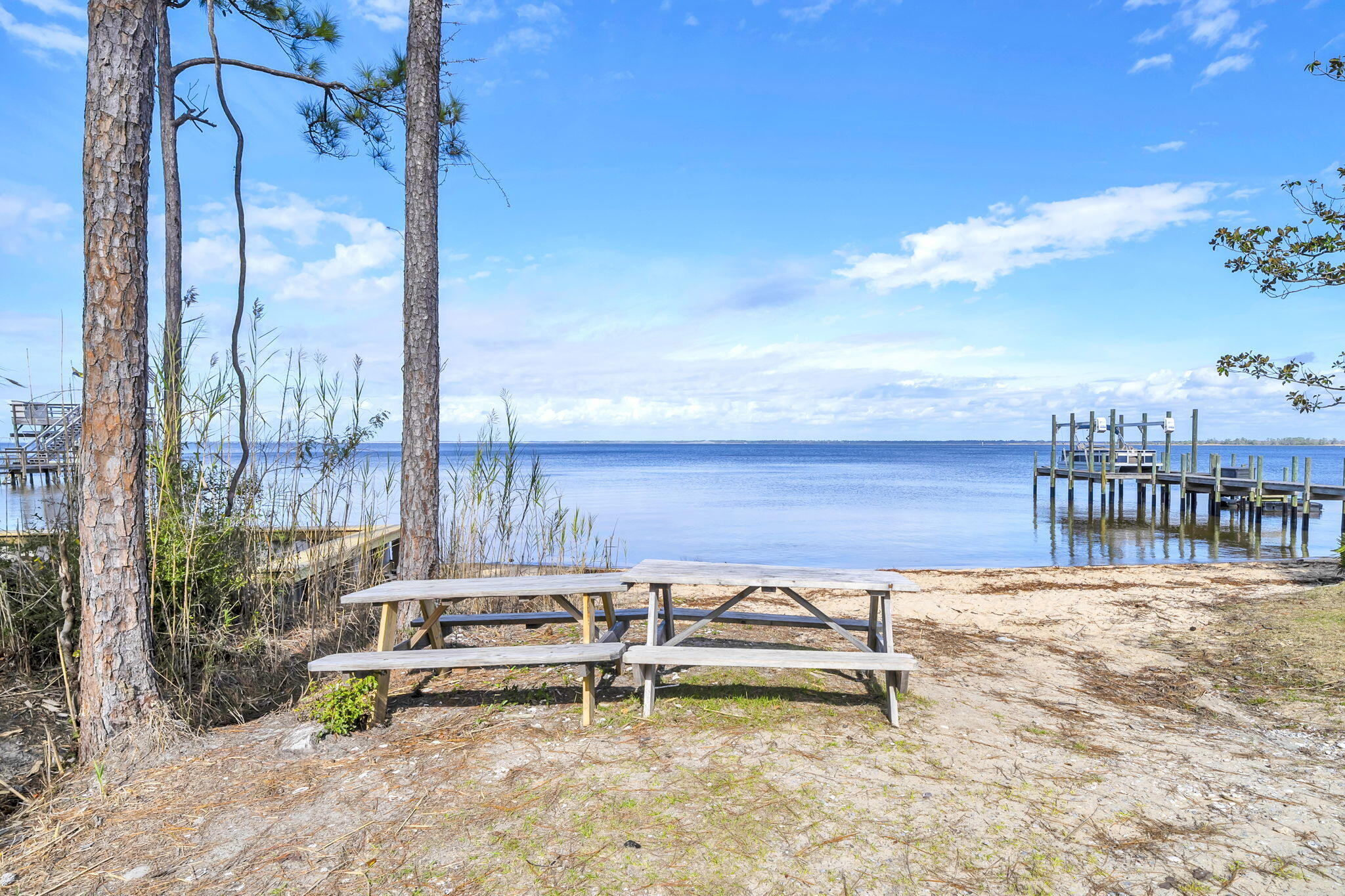 Lot 28 East Georgie Street Santa Rosa Beach, FL 32459 - Photo 5 of 6 a view of a terrace with chairs