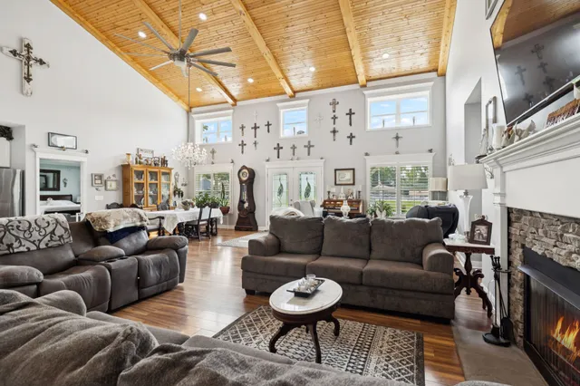 a view of a livingroom with furniture and a fireplace