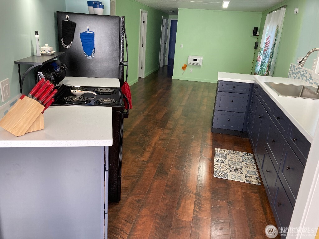 26506 Ridge Avenue Ocean Park, WA 98640 - Photo 12 of 28 a bathroom with a sink and a mirror