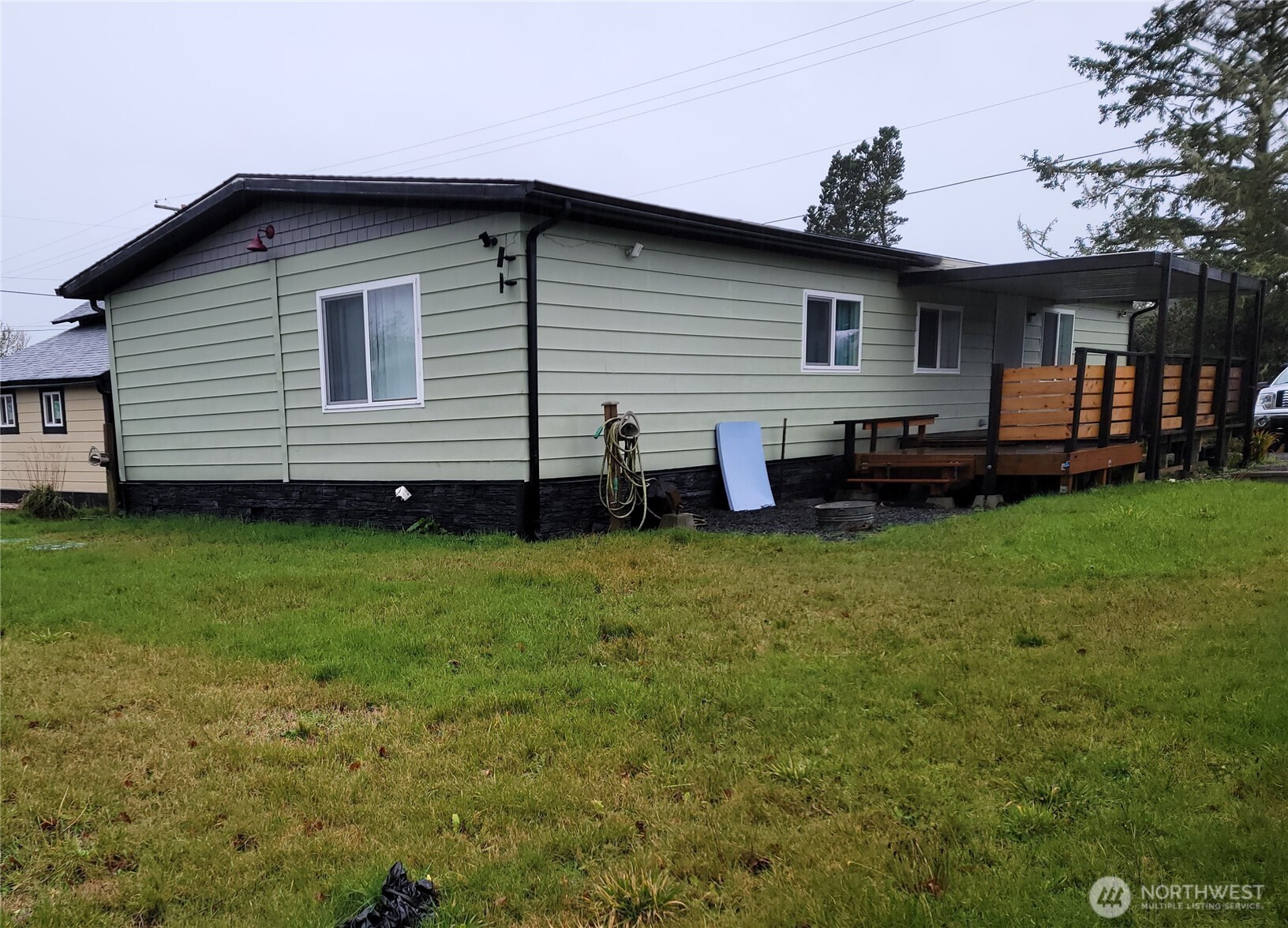 26506 Ridge Avenue Ocean Park, WA 98640 - Photo 3 of 28 a view of a house with a backyard