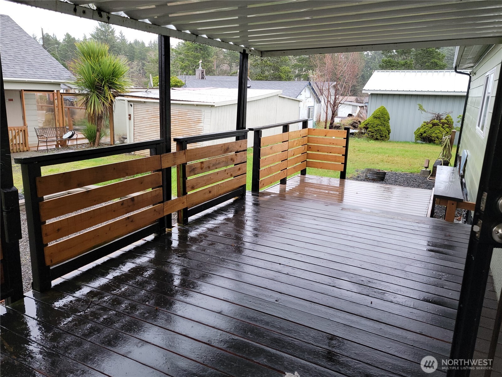 26506 Ridge Avenue Ocean Park, WA 98640 - Photo 6 of 28 a view of a deck with wooden floor