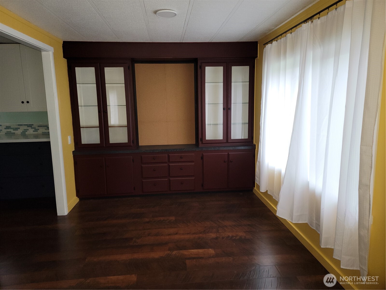 26506 Ridge Avenue Ocean Park, WA 98640 - Photo 10 of 28 a view of an entryway with wooden floor
