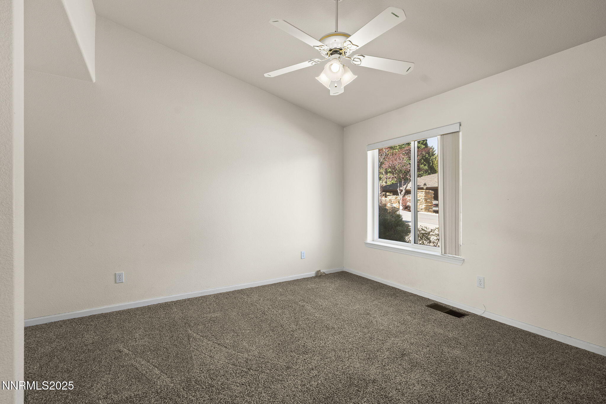 2820 East Lake Ridge Reno, NV 89519 - Photo 19 of 42 an empty room with a window