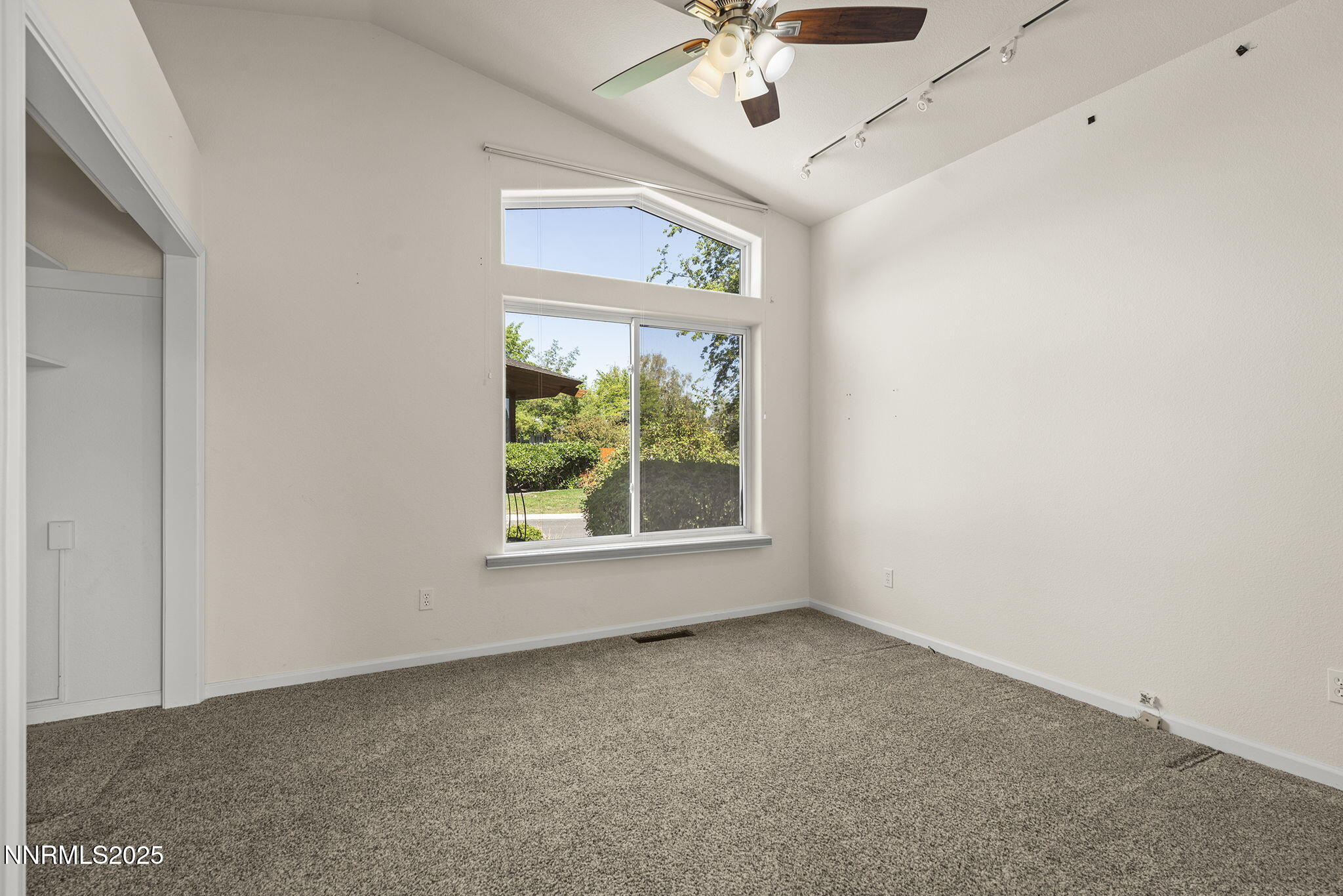 2820 East Lake Ridge Reno, NV 89519 - Photo 20 of 42 an empty room with a window