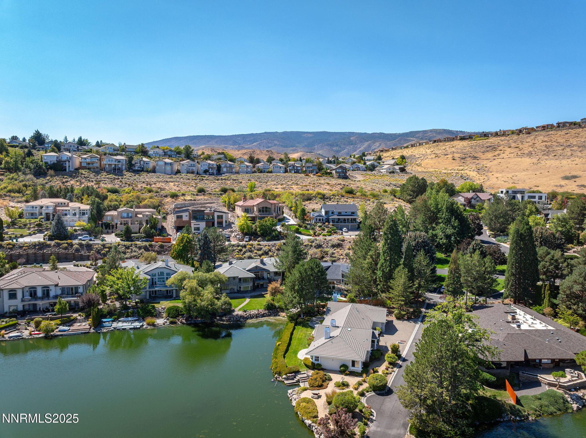 2820 East Lake Ridge Reno, NV 89519 - Photo 37 of 42 an aerial view of a house with a lake view