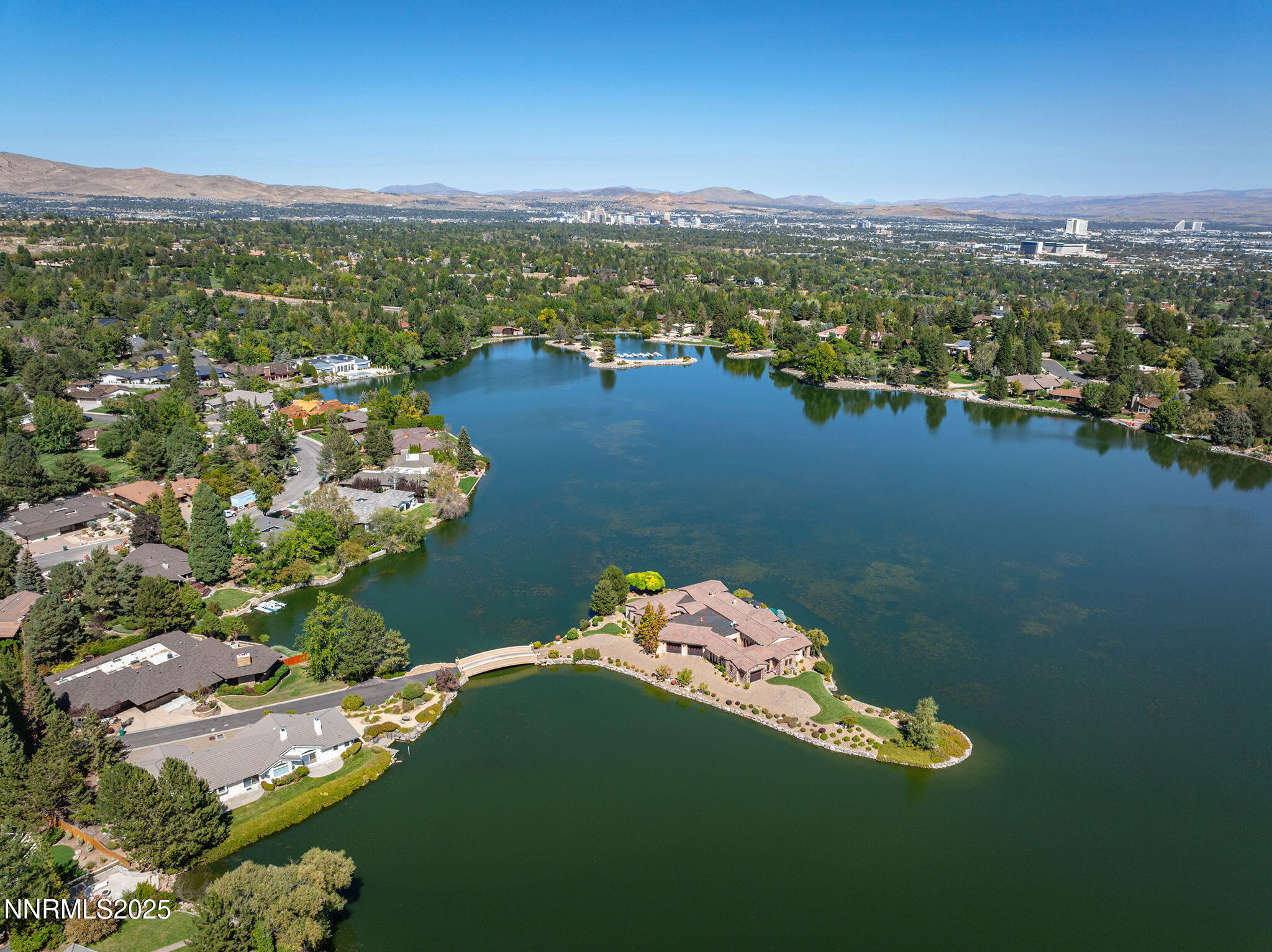 2820 East Lake Ridge Reno, NV 89519 - Photo 38 of 42 a view of a lake with a city
