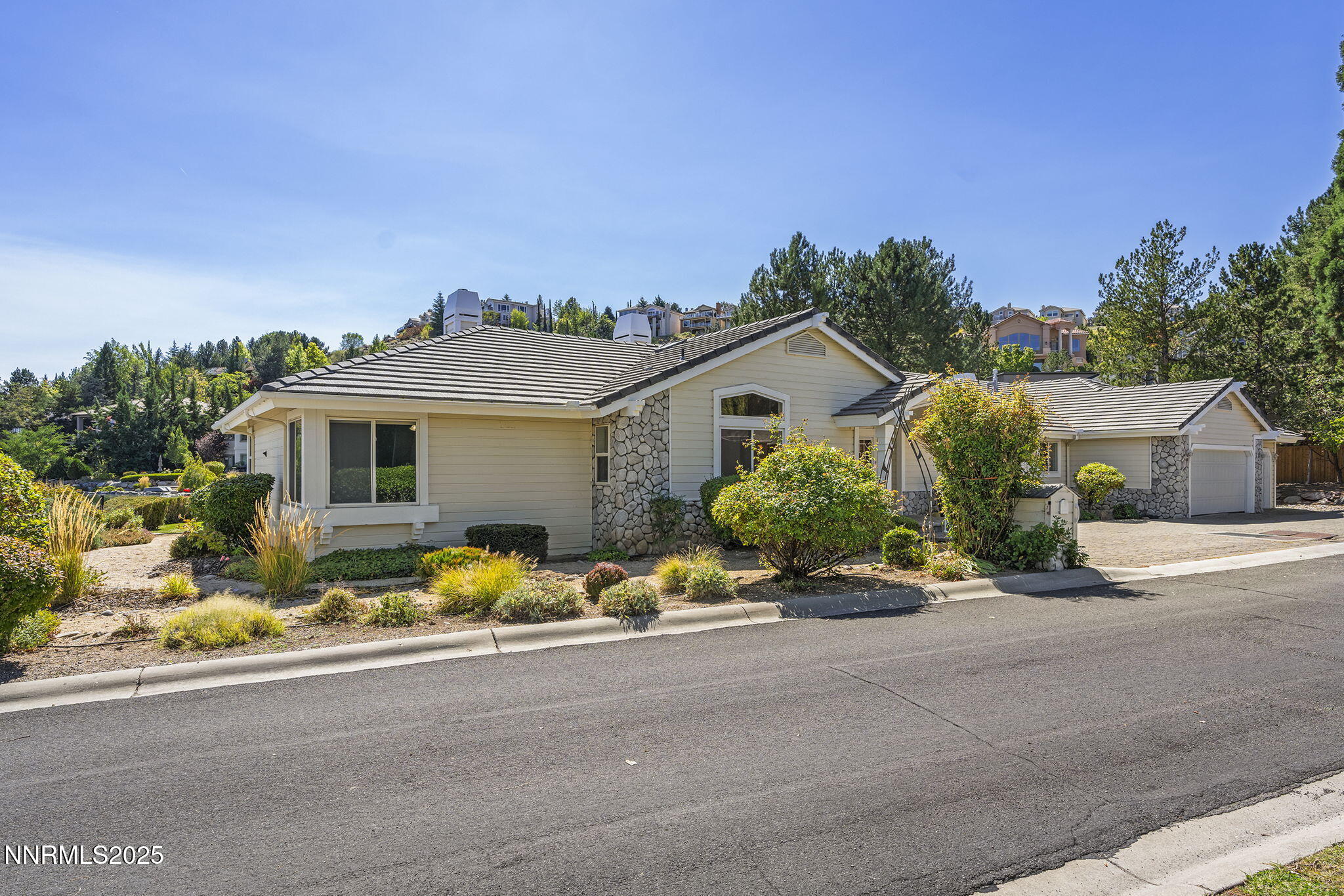 2820 East Lake Ridge Reno, NV 89519 - Photo 6 of 42 front view of a house with a patio