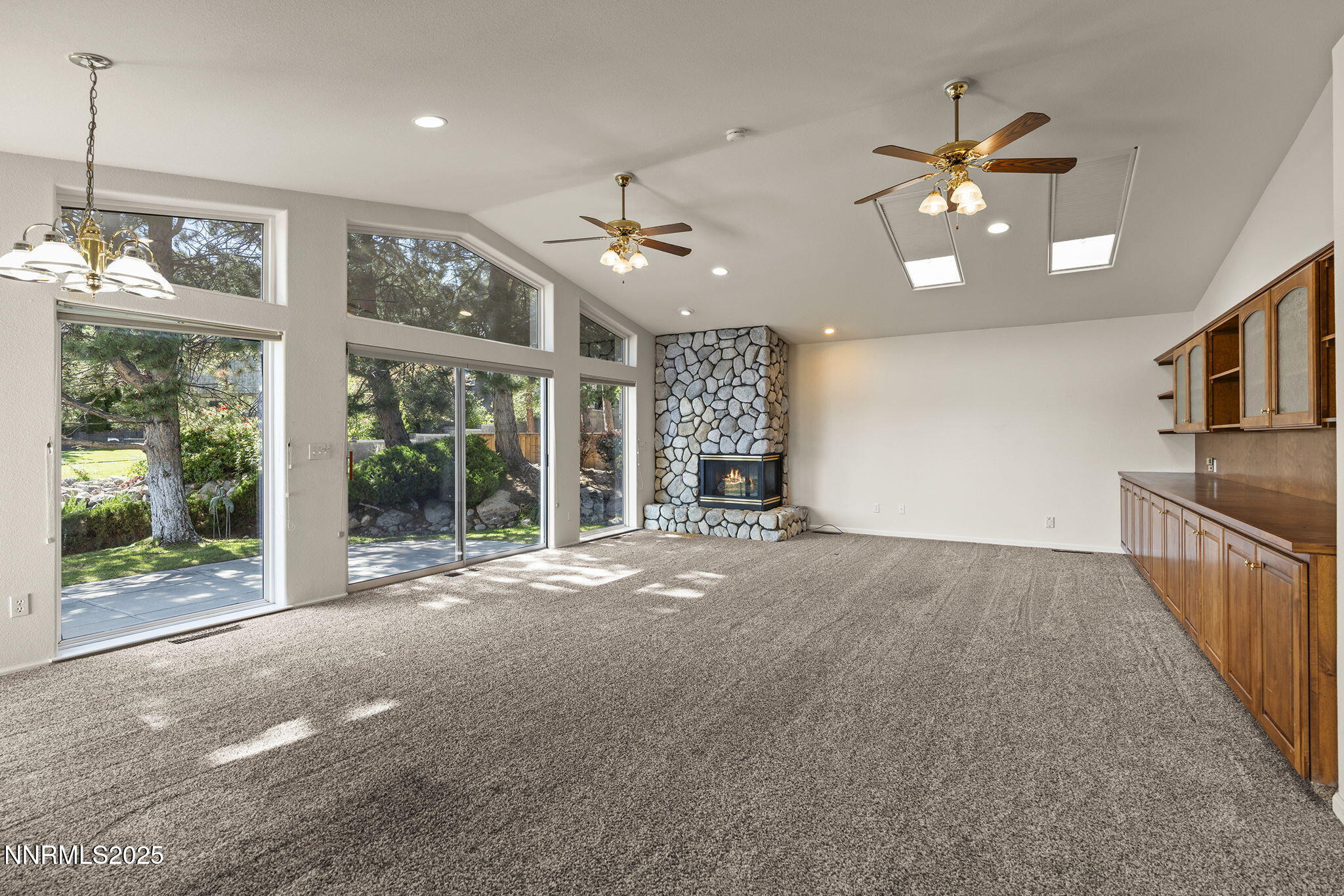 2820 East Lake Ridge Reno, NV 89519 - Photo 7 of 42 a view of livingroom with hardwood floor and ceiling fan