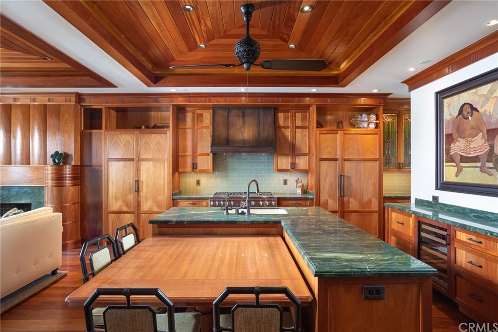 35475 Beach Road Dana Point, CA 92624 - Photo 11 of 59 a dining room with wooden floor and stainless steel appliances