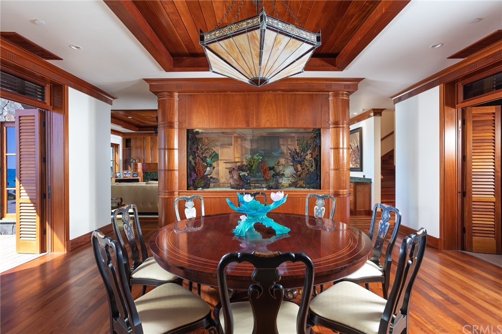 35475 Beach Road Dana Point, CA 92624 - Photo 14 of 59 a view of a dining room with furniture window and wooden floor