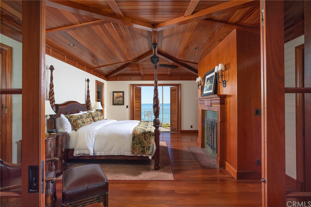 35475 Beach Road Dana Point, CA 92624 - Photo 17 of 59 a bed room with a bed and a chair