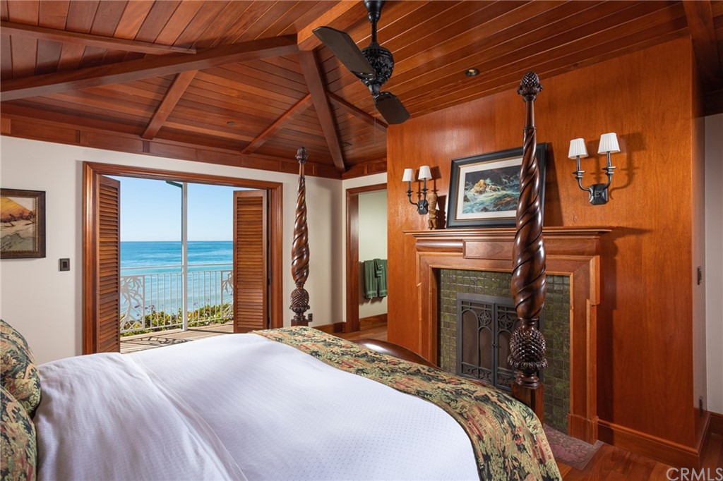 35475 Beach Road Dana Point, CA 92624 - Photo 18 of 59 a bedroom with a bed next to a window