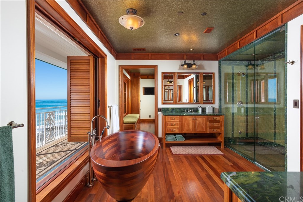 35475 Beach Road Dana Point, CA 92624 - Photo 19 of 59 a bathroom with a sink and a mirror