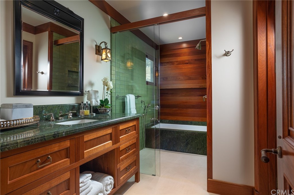 35475 Beach Road Dana Point, CA 92624 - Photo 27 of 59 a bathroom with a sink and a mirror