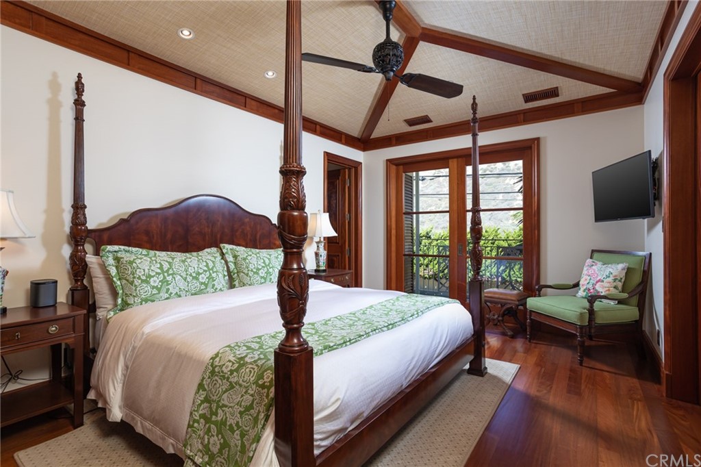 35475 Beach Road Dana Point, CA 92624 - Photo 30 of 59 a bedroom with a large bed and a large window