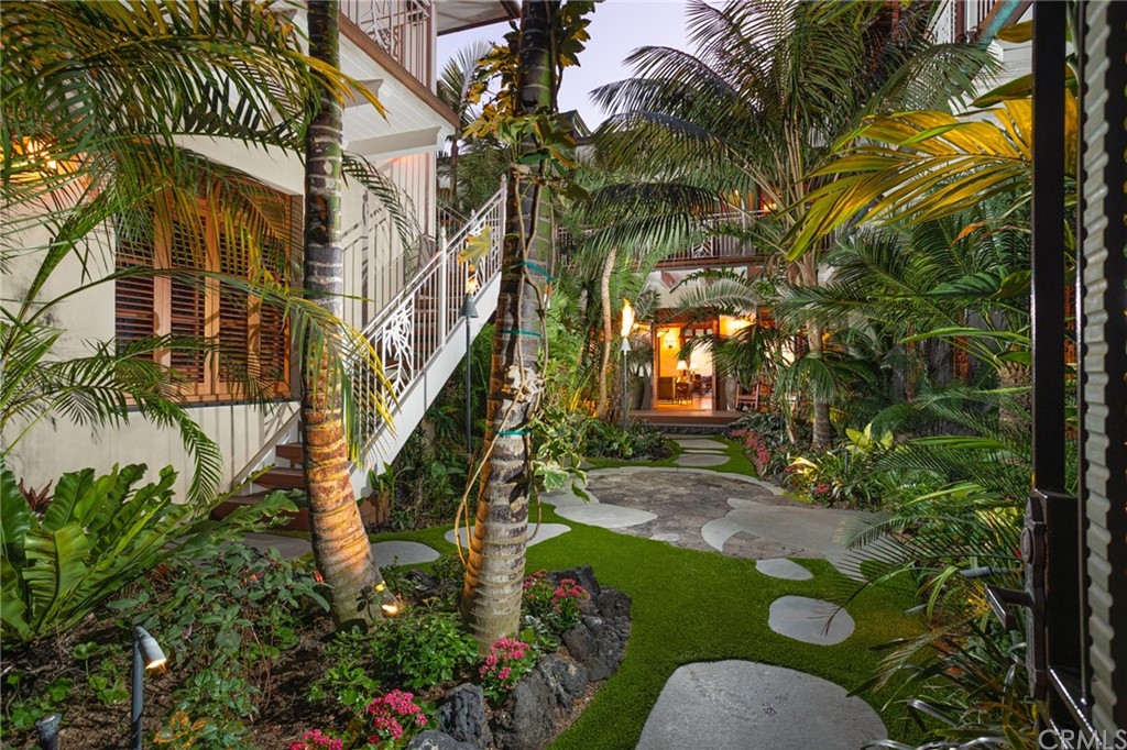 35475 Beach Road Dana Point, CA 92624 - Photo 32 of 59 a backyard of a house with a yard and outdoor seating