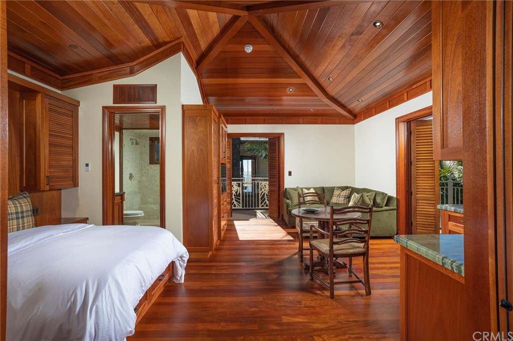 35475 Beach Road Dana Point, CA 92624 - Photo 40 of 59 a dining room with furniture and wooden floor