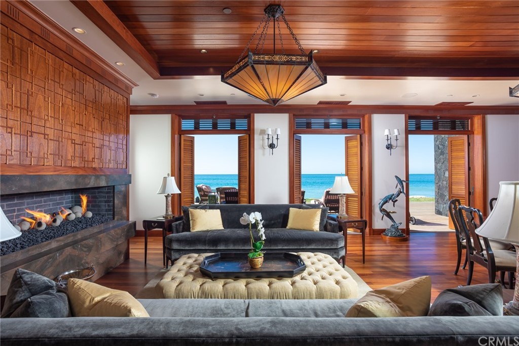 35475 Beach Road Dana Point, CA 92624 - Photo 7 of 59 a living room with furniture and a fireplace