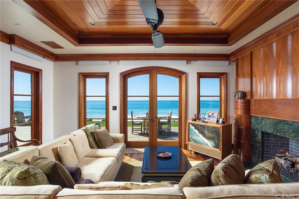 35475 Beach Road Dana Point, CA 92624 - Photo 10 of 59 a living room with furniture and a floor to ceiling window