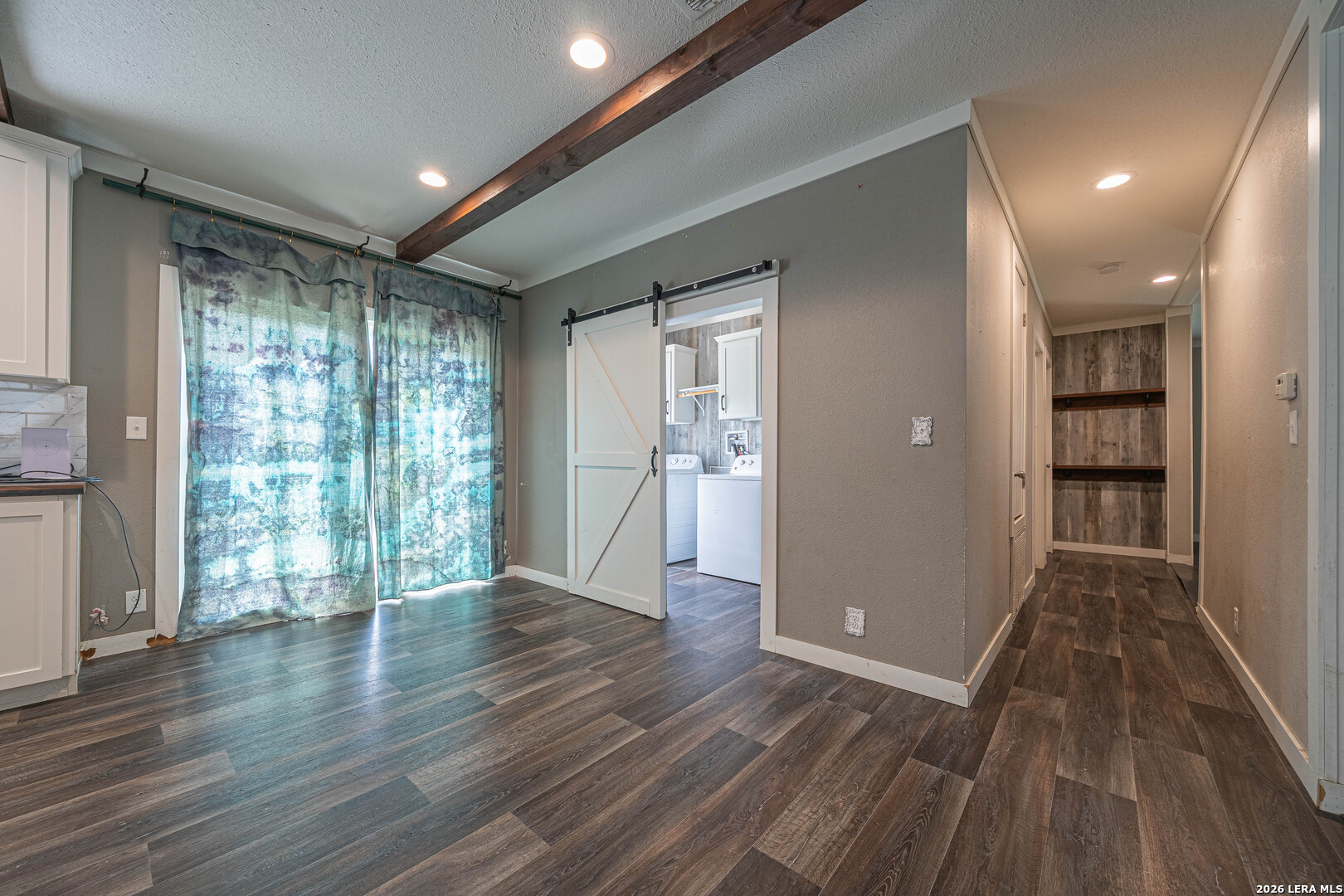 3433 Gander Slough Road Kingsbury, TX 78638 - Photo 6 of 23 wooden floor in an empty room with a window