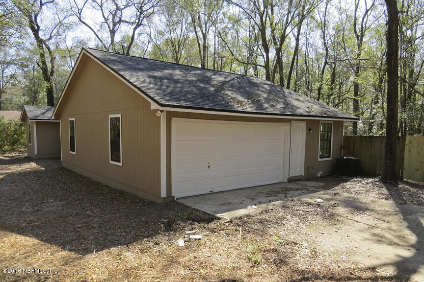 4267 Chokeberry Road Middleburg, FL 32068 - Photo 32 of 38 2 Car Garage