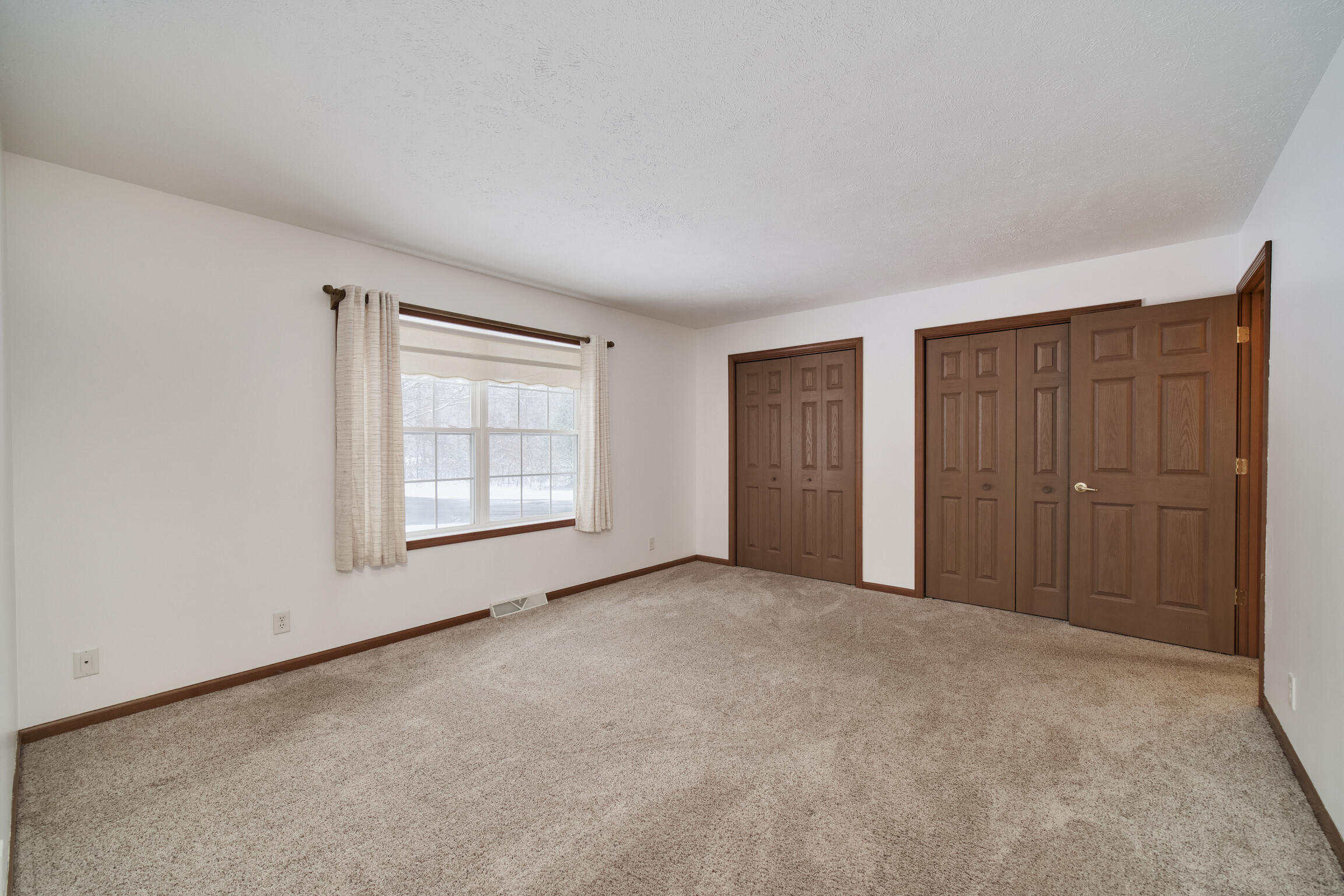 10775 Pine Creek Road Manistee, MI 49660 - Photo 20 of 74 Primary Bed
